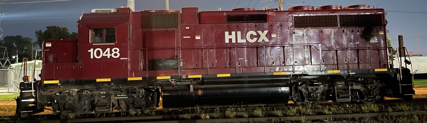 User photograph showing HLCX 1048 broadside at night